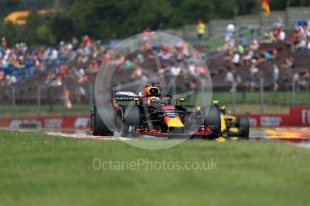 Aston Martin Red Bull Racing TAG Heuer RB14 – Daniel Ricciardo and Renault Sport F1 Team RS18 – Carlos Sainz. Hungaroring, Budapest, Hungary. Friday 27th July 2018.