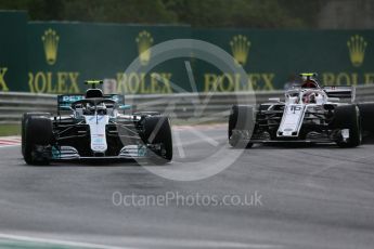 World © Octane Photographic Ltd. Formula 1 – Hungarian GP - Qualifying. Mercedes AMG Petronas Motorsport AMG F1 W09 EQ Power+ - Valtteri Bottas and Alfa Romeo Sauber F1 Team C37 – Charles Leclerc. Hungaroring, Budapest, Hungary. Saturday 28th July 2018.