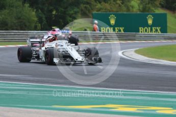 World © Octane Photographic Ltd. Formula 1 – Hungarian GP - Qualifying. Alfa Romeo Sauber F1 Team C37 – Marcus Ericsson and Sahara Force India VJM11 - Esteban Ocon. Hungaroring, Budapest, Hungary. Saturday 28th July 2018.