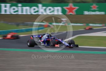 World © Octane Photographic Ltd. Formula 1 – Hungarian GP - Qualifying. Scuderia Toro Rosso STR13 – Pierre Gasly and Scuderia Ferrari SF71-H – Sebastian Vettel and Kimi Raikkonen. Hungaroring, Budapest, Hungary. Saturday 28th July 2018.