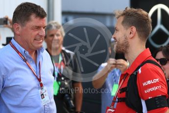 World © Octane Photographic Ltd. Formula 1 – Hungarian GP - Paddock. Scuderia Ferrari – Sebastian Vettel and Thomas Uberall - Red Bull Motorsports Manager. Hungaroring, Budapest, Hungary. Sunday 29th July 2018.