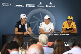 World © Octane Photographic Ltd. Formula 1 – Hungarian GP - FIA Drivers’ Press Conference. Sahara Force India - Esteban Ocon, Mercedes AMG Petronas Motorsport - Valtteri Bottas and Renault Sport F1 Team – Carlos Sainz. Hungaroring, Budapest, Hungary. Thursday 26th July 2018.