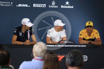 World © Octane Photographic Ltd. Formula 1 – Hungarian GP - FIA Drivers’ Press Conference. Sahara Force India - Esteban Ocon, Mercedes AMG Petronas Motorsport - Valtteri Bottas and Renault Sport F1 Team – Carlos Sainz. Hungaroring, Budapest, Hungary. Thursday 26th July 2018.