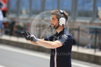World © Octane Photographic Ltd. Formula 1 – Hungarian Post-Race Test - Day 1. Sahara Force India mechanic checks orders the tyre warmers off and the car cleared before releasing Nicholas Latifi from his garage. Hungaroring, Budapest, Hungary. Tuesday 31st July 2018.