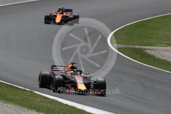 World © Octane Photographic Ltd. Formula 1 – In season test 1, day 1. Aston Martin Red Bull Racing TAG Heuer RB14 – Max Verstappen and McLaren MCL33 – Oliver Turvey. Circuit de Barcelona-Catalunya, Spain. Tuesday 15th May 2018.