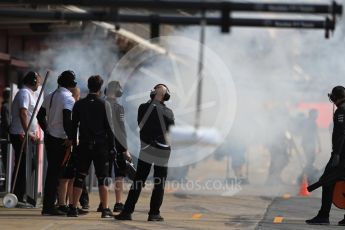 World © Octane Photographic Ltd. Formula 1 – In season test 1, day 2. Haas F1 Team smoke screen before car leaves garage. Circuit de Barcelona-Catalunya, Spain. Wednesday 16th May 2018.