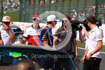 World © Octane Photographic Ltd. Formula 1 – Japanese GP - Drivers Parade. Scuderia Toro Rosso STR13 – Pierre Gasly, McLaren MCL33 – Stoffel Vandoorne and Haas F1 Team VF-18 – Romain Grosjean. Suzuka Circuit, Japan. Sunday 7th October 2018.