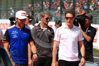 World © Octane Photographic Ltd. Formula 1 – Japanese GP - Drivers Parade. Scuderia Toro Rosso STR13 – Pierre Gasly, McLaren MCL33 – Stoffel Vandoorne and Haas F1 Team VF-18 – Romain Grosjean. Suzuka Circuit, Japan. Sunday 7th October 2018.