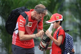 World © Octane Photographic Ltd. Formula 1 – Japanese GP - Paddock. Scuderia Ferrari SF71-H – Sebastian Vettel and young fan. Suzuka Circuit, Japan. Friday 5th October 2018.