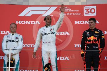 World © Octane Photographic Ltd. Formula 1 – Japanese GP – Podium. Mercedes AMG Petronas Motorsport AMG F1 W09 EQ Power+ - Lewis Hamilton and Valtteri Bottas and Aston Martin Red Bull Racing TAG Heuer RB14 – Max Verstappen. Suzuka Circuit, Japan. Sunday 7th October 2018.
