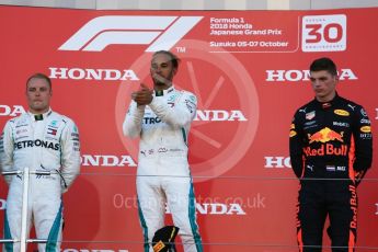World © Octane Photographic Ltd. Formula 1 – Japanese GP – Podium. Mercedes AMG Petronas Motorsport AMG F1 W09 EQ Power+ - Lewis Hamilton and Valtteri Bottas and Aston Martin Red Bull Racing TAG Heuer RB14 – Max Verstappen. Suzuka Circuit, Japan. Sunday 7th October 2018.