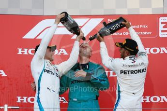 World © Octane Photographic Ltd. Formula 1 – Japanese GP – Podium. Mercedes AMG Petronas Motorsport AMG F1 W09 EQ Power+ - Lewis Hamilton and Valtteri Bottas. Suzuka Circuit, Japan. Sunday 7th October 2018.