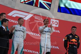 World © Octane Photographic Ltd. Formula 1 – Japanese GP – Podium. Mercedes AMG Petronas Motorsport AMG F1 W09 EQ Power+ - Lewis Hamilton and Valtteri Bottas and Aston Martin Red Bull Racing TAG Heuer RB14 – Max Verstappen. Suzuka Circuit, Japan. Sunday 7th October 2018.
