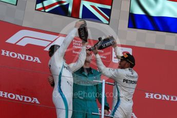 World © Octane Photographic Ltd. Formula 1 – Japanese GP – Podium. Mercedes AMG Petronas Motorsport AMG F1 W09 EQ Power+ - Lewis Hamilton and Valtteri Bottas. Suzuka Circuit, Japan. Sunday 7th October 2018.