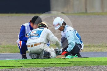 World © Octane Photographic Ltd. Formula 1 – Japanese GP - Practice 1. Repairs to trackside astro turf. Suzuka Circuit, Japan. Friday 5th October 2018.