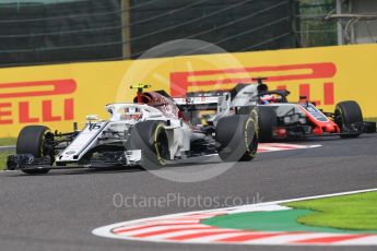 World © Octane Photographic Ltd. Formula 1 – Japanese GP - Practice 1. Alfa Romeo Sauber F1 Team C37 – Charles Leclerc and Haas F1 Team VF-18 – Romain Grosjean. Suzuka Circuit, Japan. Friday 5th October 2018.