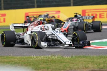 World © Octane Photographic Ltd. Formula 1 – Japanese GP - Practice 1. Alfa Romeo Sauber F1 Team C37 – Charles Leclerc and Haas F1 Team VF-18 – Romain Grosjean. Suzuka Circuit, Japan. Friday 5th October 2018.