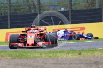 World © Octane Photographic Ltd. Formula 1 – Japanese GP - Practice 1. Scuderia Ferrari SF71-H – Sebastian Vettel and Scuderia Toro Rosso STR13 – Brendon Hartley. Suzuka Circuit, Japan. Friday 5th October 2018.