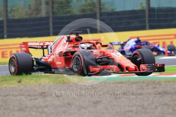 World © Octane Photographic Ltd. Formula 1 – Japanese GP - Practice 1. Scuderia Ferrari SF71-H – Sebastian Vettel and Scuderia Toro Rosso STR13 – Brendon Hartley. Suzuka Circuit, Japan. Friday 5th October 2018.