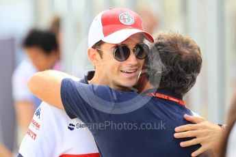 World © Octane Photographic Ltd. Formula 1 – Japanese GP - Paddock. Alfa Romeo Sauber F1 Team C37 – Charles Leclerc and Jean Alesi. Suzuka Circuit, Japan. Sunday 7th October 2018.