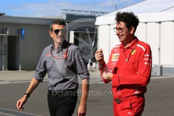 World © Octane Photographic Ltd. Formula 1 - Japanese GP - Paddock. Guenther Steiner  - Team Principal of Haas F1 Team and Mattia Binotto – Chief Technical Officer - Scuderia Ferrari. Suzuka Circuit, Japan. Sunday 7th October 2018.