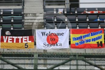 World © Octane Photographic Ltd. Formula 1 – Japanese GP – Fans' Vettel; and Alonso flags in the main grandstand. Suzuka Circuit, Japan. Thursday 4th October 2018.