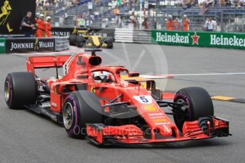World © Octane Photographic Ltd. Formula 1 – Monaco GP - Practice 2. Scuderia Ferrari SF71-H – Sebastian Vettel and Renault Sport F1 Team RS18 – Nico Hulkenberg. Monte-Carlo. Thursday 24th May 2018.