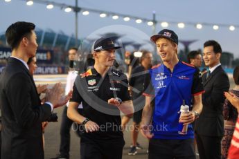 World © Octane Photographic Ltd. Formula 1 – Singapore GP - Drivers Parade. Scuderia Toro Rosso STR13 – Brendon Hartley and Aston Martin Red Bull Racing TAG Heuer RB14 – Max Verstappen. Marina Bay Street Circuit, Singapore. Sunday 16th September 2018.