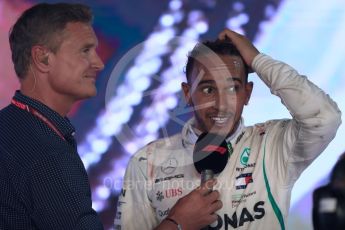 World © Octane Photographic Ltd. Formula 1 – Singapore GP – Race Podium. Mercedes AMG Petronas Motorsport AMG F1 W09 EQ Power+ - Lewis Hamilton and David Coulthard. Marina Bay Street Circuit, Singapore. Sunday 16th September 2018.
