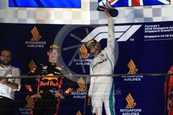 World © Octane Photographic Ltd. Formula 1 – Singapore GP – Race Podium. Mercedes AMG Petronas Motorsport AMG F1 W09 EQ Power+ - Lewis Hamilton and Aston Martin Red Bull Racing TAG Heuer RB14 – Max Verstappen. Marina Bay Street Circuit, Singapore. Sunday 16th September 2018.