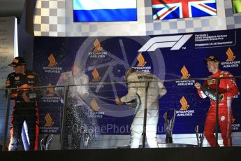 World © Octane Photographic Ltd. Formula 1 – Singapore GP – Race Podium. Mercedes AMG Petronas Motorsport AMG F1 W09 EQ Power+ - Lewis Hamilton, Aston Martin Red Bull Racing TAG Heuer RB14 – Max Verstappen and Scuderia Ferrari SF71-H – Sebastian Vettel. Marina Bay Street Circuit, Singapore. Sunday 16th September 2018.