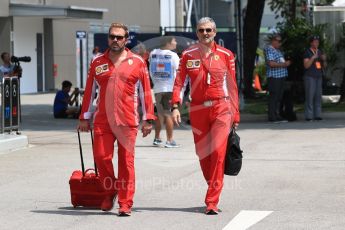 World © Octane Photographic Ltd. Formula 1 - Singapore GP - Paddock. Maurizio Arrivabene – Managing Director and Team Principal of Scuderia Ferrari and Gino Rosato – Ferrari Corporate Affairs. Marina Bay Street Circuit, Singapore. Friday 14th September 2018.