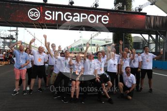 World © Octane Photographic Ltd. Formula 1 – Singapore GP - Thursday Pit Lane. Formula 1 in Schools group photo (Staff). Marina Bay Street Circuit, Singapore. Thursday 13th September 2018.