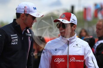 World © Octane Photographic Ltd. Formula 1 – Spanish GP - Drivers’ Parade. Sahara Force India VJM11 - Esteban Ocon and Alfa Romeo Sauber F1 Team C37 – Charles Leclerc. Circuit de Barcelona-Catalunya, Spain. Sunday 13th May 2018.