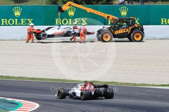 World © Octane Photographic Ltd. Formula 1 – Spanish GP - Practice 2. Haas F1 Team VF-18 – Romain Grosjean and Alfa Romeo Sauber F1 Team C37 – Marcus Ericsson. Circuit de Barcelona-Catalunya, Spain. Friday 11th May 2018.