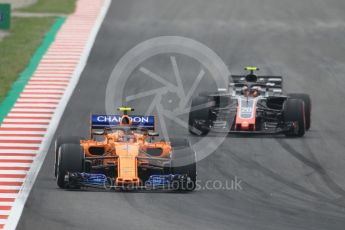 World © Octane Photographic Ltd. Formula 1 – Spanish GP - Saturday Qualifying. McLaren MCL33 – Stoffel Vandoorne and Haas F1 Team VF-18 – Kevin Magnussen. Circuit de Barcelona-Catalunya, Spain. Saturday 12th May 2018.