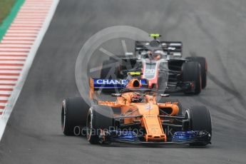 World © Octane Photographic Ltd. Formula 1 – Spanish GP - Saturday Qualifying. McLaren MCL33 – Stoffel Vandoorne and Haas F1 Team VF-18 – Kevin Magnussen. Circuit de Barcelona-Catalunya, Spain. Saturday 12th May 2018.