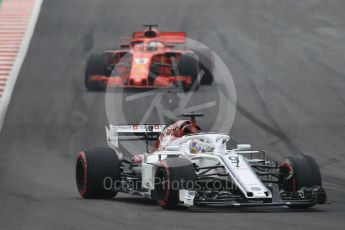 World © Octane Photographic Ltd. Formula 1 – Spanish GP - Saturday Qualifying. Alfa Romeo Sauber F1 Team C37 – Marcus Ericsson and Scuderia Ferrari SF71-H – Sebastian Vettel. Circuit de Barcelona-Catalunya, Spain. Saturday 12th May 2018.