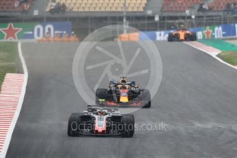 World © Octane Photographic Ltd. Formula 1 – Spanish GP - Saturday Qualifying. Haas F1 Team VF-18 – Kevin Magnussen, Aston Martin Red Bull Racing TAG Heuer RB14 – Daniel Ricciardo and McLaren MCL33 – Stoffel Vandoorne. Circuit de Barcelona-Catalunya, Spain. Saturday 12th May 2018.