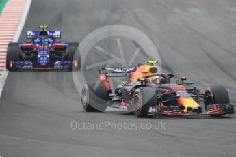 World © Octane Photographic Ltd. Formula 1 – Spanish GP - Saturday Qualifying. Aston Martin Red Bull Racing TAG Heuer RB14 – Max Verstappen and Scuderia Toro Rosso STR13 – Pierre Gasly. Circuit de Barcelona-Catalunya, Spain. Saturday 12th May 2018.