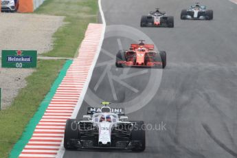 World © Octane Photographic Ltd. Formula 1 – Spanish GP - Saturday Qualifying. Williams Martini Racing FW41 – Sergey Sirotkin, Scuderia Ferrari SF71-H – Sebastian Vettel, Haas F1 Team VF-18 – Romain Grosjean and Mercedes AMG Petronas Motorsport AMG F1 W09 EQ Power+ - Lewis Hamilton. Circuit de Barcelona-Catalunya, Spain. Saturday 12th May 2018.