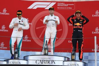 World © Octane Photographic Ltd. Formula 1 – Spanish GP - Sunday Podium. Mercedes AMG Petronas Motorsport AMG F1 W09 EQ Power+ - Lewis Hamilton (1st) Valtteri Bottas (2nd) and Aston Martin Red Bull Racing TAG Heuer RB14 – Max Verstappen (3rd). Circuit de Barcelona-Catalunya, Spain. Sunday 13th May 2018.