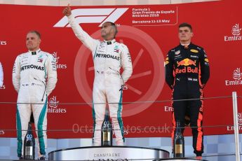 World © Octane Photographic Ltd. Formula 1 – Spanish GP - Sunday Podium. Mercedes AMG Petronas Motorsport AMG F1 W09 EQ Power+ - Lewis Hamilton (1st) Valtteri Bottas (2nd) and Aston Martin Red Bull Racing TAG Heuer RB14 – Max Verstappen (3rd). Circuit de Barcelona-Catalunya, Spain. Sunday 13th May 2018.