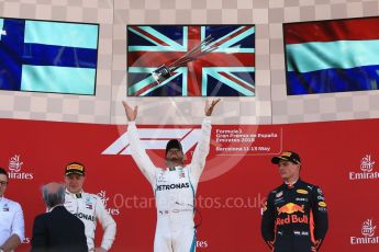 World © Octane Photographic Ltd. Formula 1 – Spanish GP - Sunday Podium. Mercedes AMG Petronas Motorsport AMG F1 W09 EQ Power+ - Lewis Hamilton (1st) Valtteri Bottas (2nd) and Aston Martin Red Bull Racing TAG Heuer RB14 – Max Verstappen (3rd). Circuit de Barcelona-Catalunya, Spain. Sunday 13th May 2018.