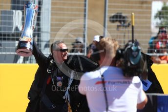 World © Octane Photographic Ltd. Formula 1 – United States GP - Grid. Parachuter brings the winners trophy. Circuit of the Americas (COTA), USA. Sunday 21st October 2018.