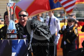 World © Octane Photographic Ltd. Formula 1 – United States GP - Grid. Parachuter brings the winners trophy. Circuit of the Americas (COTA), USA. Sunday 21st October 2018.