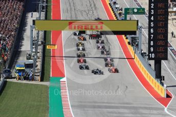 World © Octane Photographic Ltd. Formula 1 – United States GP – Race. Mercedes AMG Petronas Motorsport AMG F1 W09 EQ Power+ - Lewis Hamilton moves towards before Scuderia Ferrari SF71-H – Kimi Raikkonen takes the lead. Circuit of the Americas (COTA), USA. Sunday 21st October 2018.