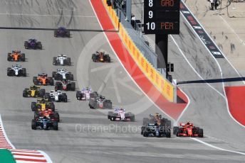 World © Octane Photographic Ltd. Formula 1 – United States GP – Race. Mercedes AMG Petronas Motorsport AMG F1 W09 EQ Power+ - Lewis Hamilton moves towards before Scuderia Ferrari SF71-H – Kimi Raikkonen takes the lead. Circuit of the Americas (COTA), USA. Sunday 21st October 2018.
