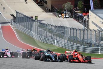 World © Octane Photographic Ltd. Formula 1 – United States GP – Race. Mercedes AMG Petronas Motorsport AMG F1 W09 EQ Power+ - Lewis Hamilton moves towards before Scuderia Ferrari SF71-H – Kimi Raikkonen takes the lead. Circuit of the Americas (COTA), USA. Sunday 21st October 2018.