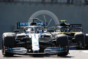 World © Octane Photographic Ltd. Formula 1 – Abu Dhabi GP - Practice 1. Mercedes AMG Petronas Motorsport AMG F1 W10 EQ Power+ - Lewis Hamilton and Renault Sport F1 Team RS19 – Nico Hulkenberg. Yas Marina Circuit, Abu Dhabi, UAE. Friday 29th November 2019.